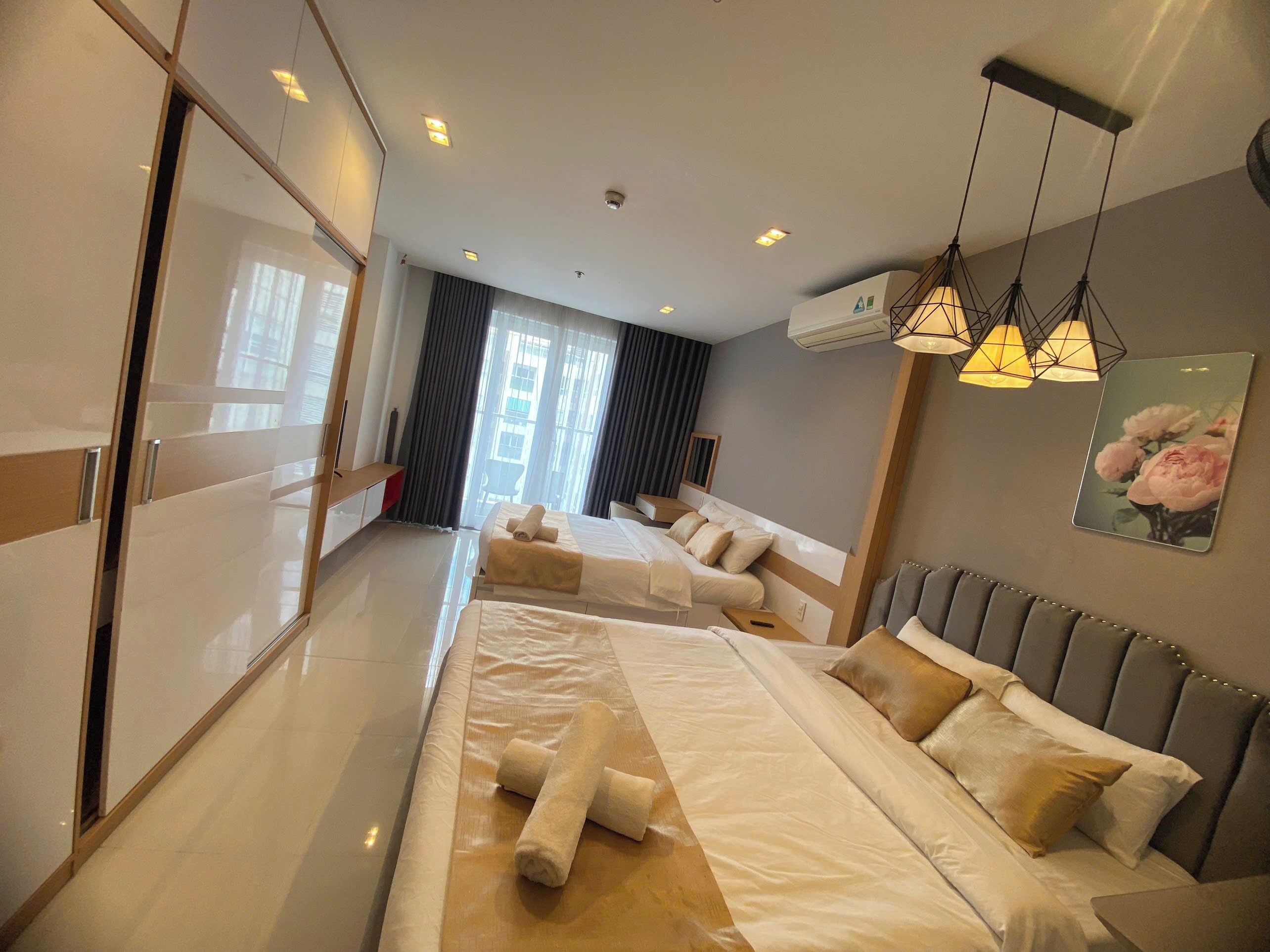 Executive Apartment, Multiple Beds, Balcony, Pool View | Free minibar, individually furnished, desk, laptop workspace