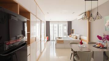 Executive Apartment, Multiple Beds, Balcony, Pool View | Free minibar, individually furnished, desk, laptop workspace