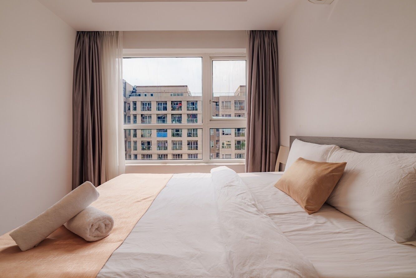 Family Apartment, Balcony, Pool View | Free minibar, individually furnished, desk, laptop workspace