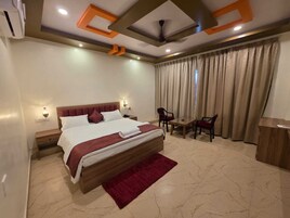 Deluxe Room, City View | Desk, laptop workspace, free WiFi