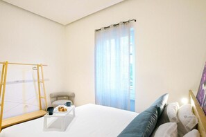 مكواة/لوح كي وواي فاي وملاءات أسرّة