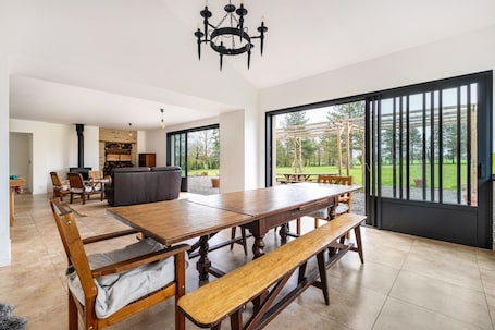 Dining. Gite La petite Hugrie – Renovated Farmhouse with Spa, Park, and Countryside Views