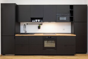 Apartamento | Cozinha privada | Micro-ondas, lava-louças, máquina de café expresso, cafeteira/chaleira