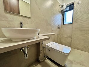 Deluxe Double Room, City View | Bathroom | Shower, free toiletries, towels, soap - Zenith Homes - Premium Suites (Mumbai)