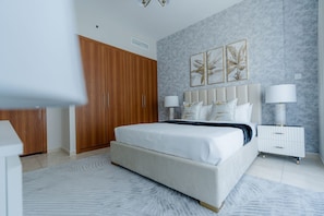 Luxury Apartment, Balcony, City View | In-room safe, blackout curtains, soundproofing, iron/ironing board - Iconic 2BR in Skycourt Dubailand (Dubai)