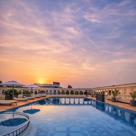 Seasonal outdoor pool. WelcomHeritage Akashganga Resort & Spa