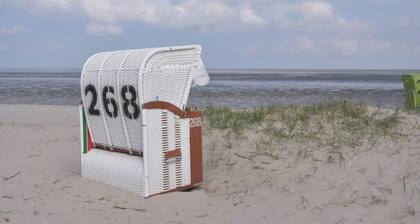 Nordseehus Sandkorn – Ferienhaus für 4 Personen, gemütlich & maritim in Hooksiel