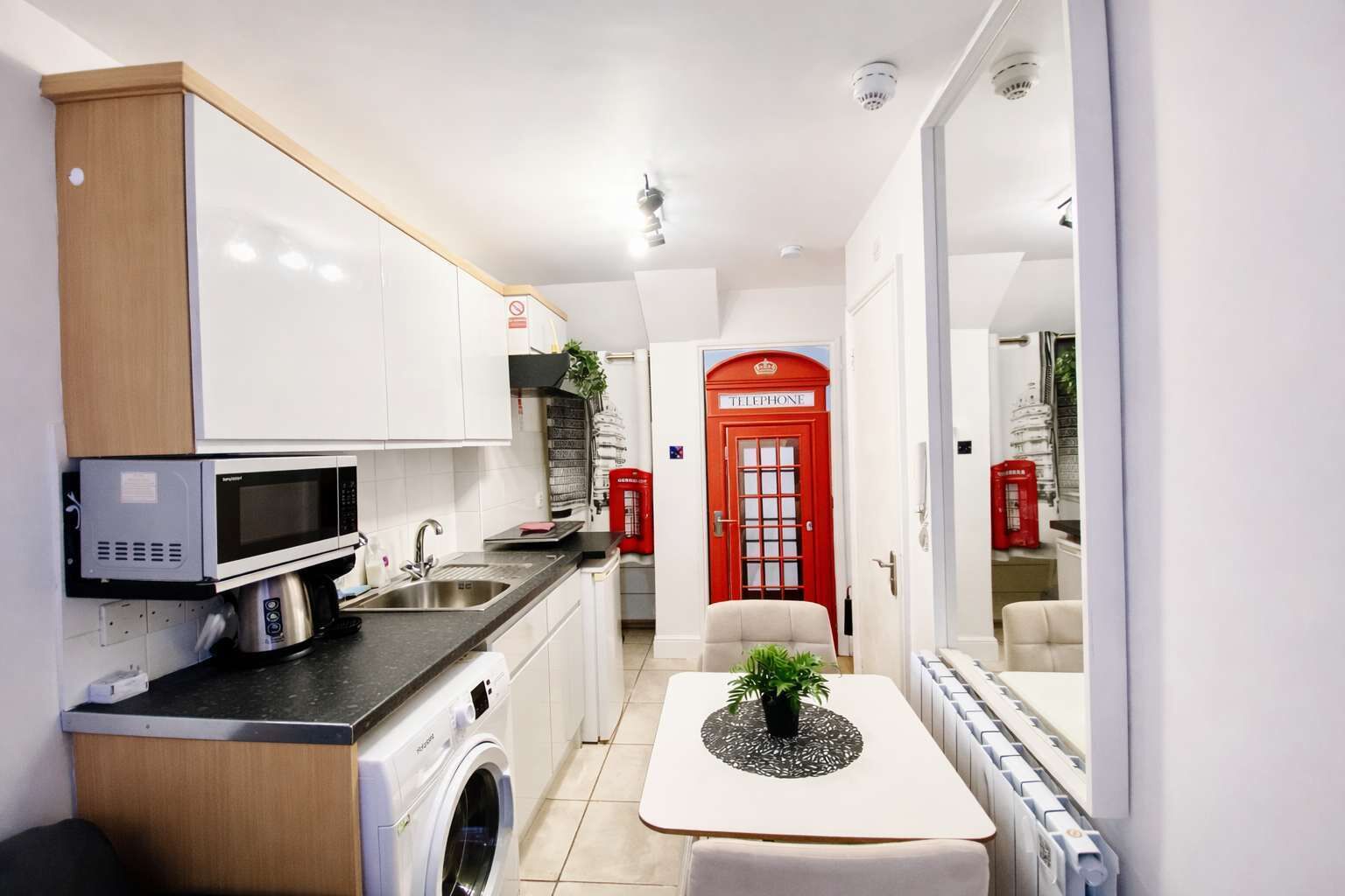 Fridge, microwave, stovetop, coffee/tea maker