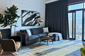 Living area - Luxe 1-BR w/ Pool Sunset Balcony View in The Greens (Dubai)