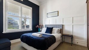 4 bedrooms, iron/ironing board, travel cot, WiFi