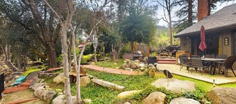 Yard & Patio: Quiet & Well-stocked Riverside Home