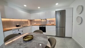 Deluxe Apartment, Garden View | Private kitchen | Fridge, microwave, oven, stovetop - Kantara Apartment w Pool by TrulyCyprus (Limassol)