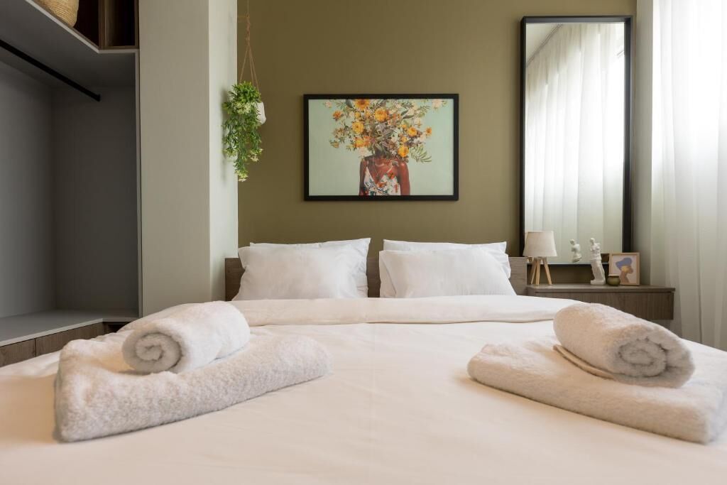 Departamento Deluxe, 2 camas Queen size | Escritorio y espacio para trabajar con laptop 