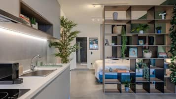 Deluxe Apartment, 2 Queen Beds | Private kitchen | Full-sized fridge, microwave, oven, stovetop