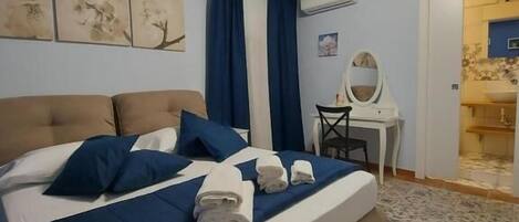 Desk, laptop workspace, blackout curtains, soundproofing