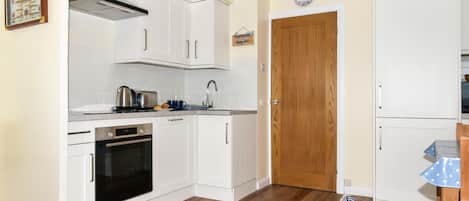 Microwave, oven, cookware/dishes/utensils