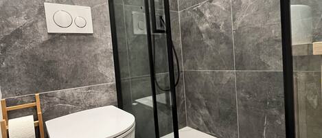 Shower, hair dryer, towels, soap