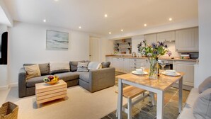 A modern apartment with a living room, dining area, and kitchen. - 1 Bed in St Ives (oc-salt3) (Saint Ives)
