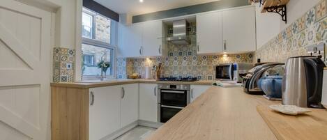 Microwave, oven, cookware/dishes/utensils