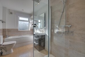 A modern bathroom with a glass-enclosed shower, a bathtub, and a toilet. - 2 Bed in Gunnerside (oc-ds945) (Gunnerside)