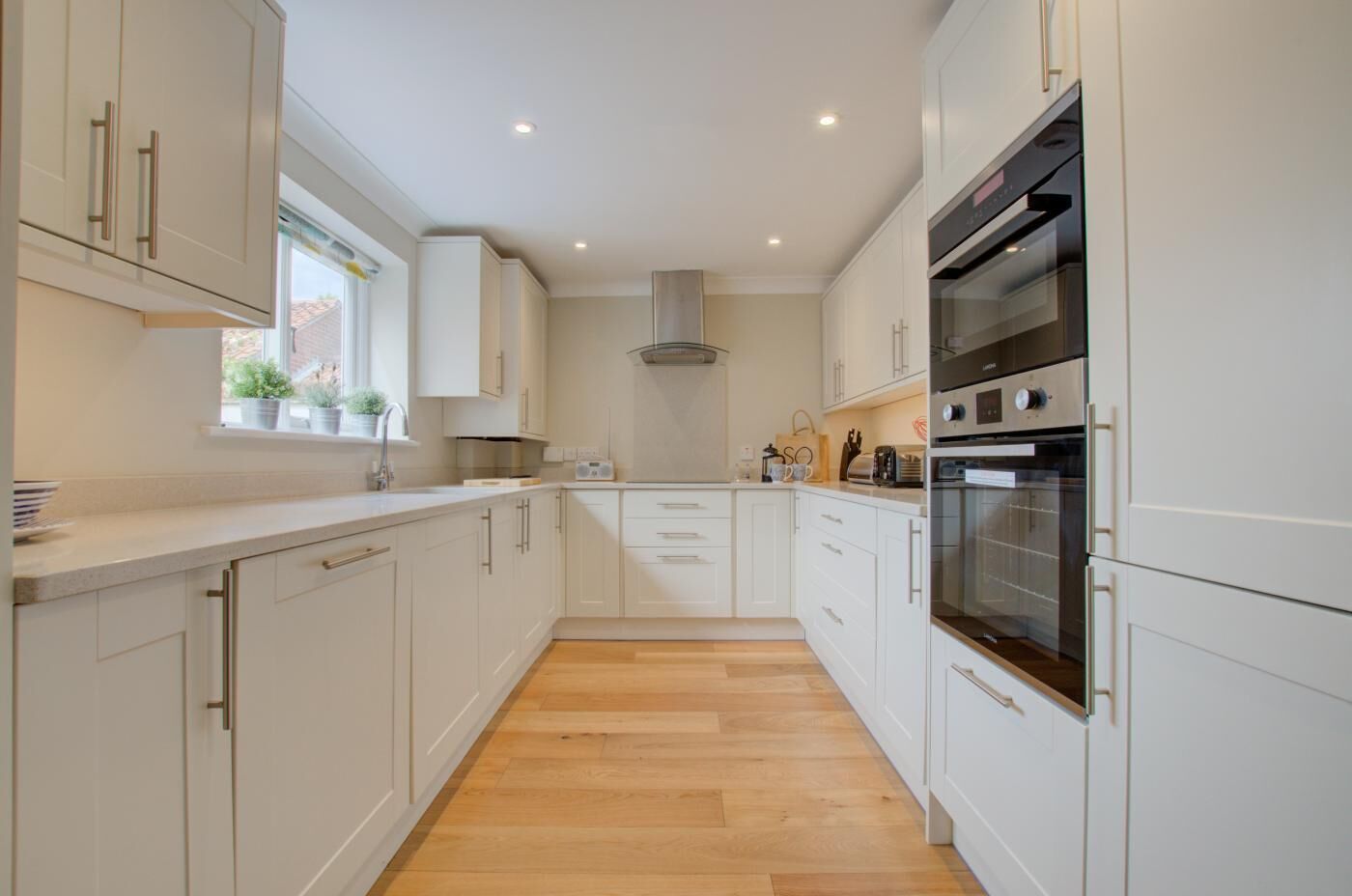 Oven, dishwasher, high chair, cookware/dishes/utensils