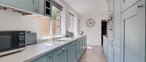 Oven, dishwasher, highchair, cookware/dishes/utensils