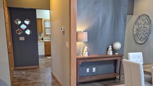 A modern kitchen with wooden cabinets, a built-in oven, and a dishwasher. - Modern with traditional style 3-bed+ condo, wifi laundry in charming Laurel Oaks (Lima)