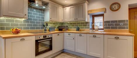 Oven, dishwasher, highchair, cookware/dishes/utensils