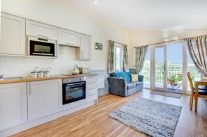 Oven, high chair, cookware/dishes/utensils