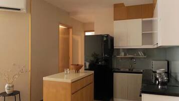 Presidential Suite, 2 Bedrooms, Club lounge access, City View | Private kitchen | Full-sized fridge, microwave, oven, stovetop