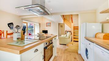 Oven, dishwasher, high chair, cookware/dishes/utensils