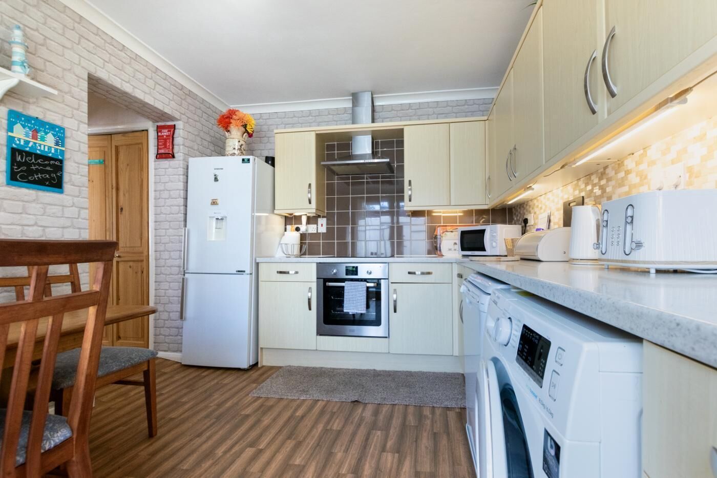 Oven, dishwasher, high chair, cookware/dishes/utensils