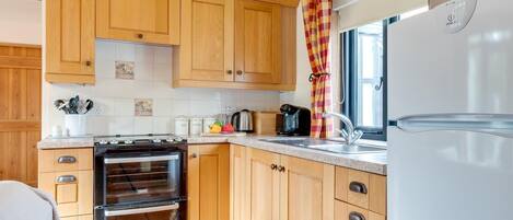 Microwave, oven, high chair, cookware/dishes/utensils