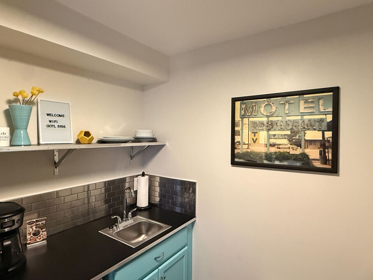 Microwave, coffee/tea maker, cookware/dishes/utensils, paper towels