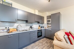 Microwave, oven, highchair, cookware/dishes/utensils