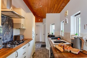 Microwave, oven, high chair, cookware/dishes/utensils