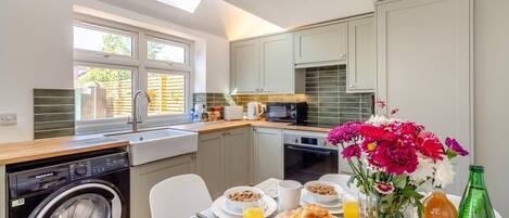 Oven, high chair, cookware/dishes/utensils