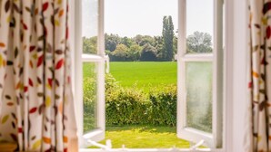 An open window with a view of a green field and trees. - 3 Bed in Lower Holbrook (oc-2aglh) (Lower Holbrook)