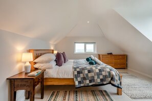 Tabla de planchar con plancha, wifi gratis y ropa de cama 