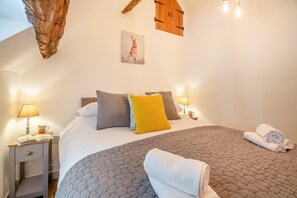 2 chambres, fer et planche à repasser, lit de bébé portatif