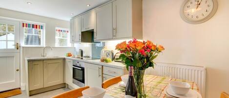 Oven, dishwasher, high chair, cookware/dishes/utensils