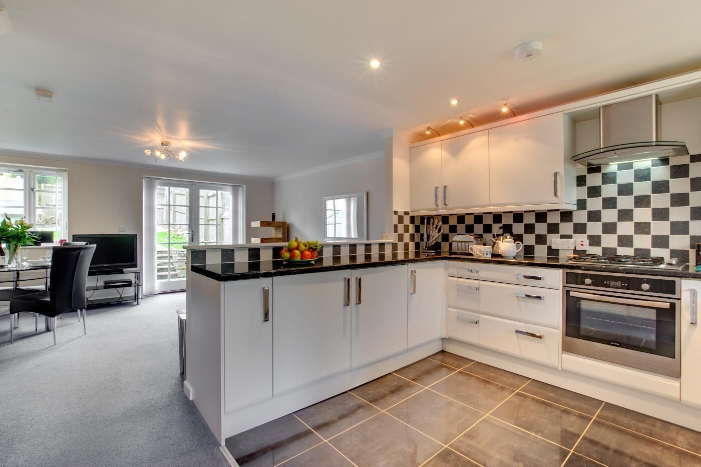 Oven, dishwasher, high chair, cookware/dishes/utensils