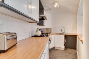 Microwave, oven, cookware/dishes/utensils