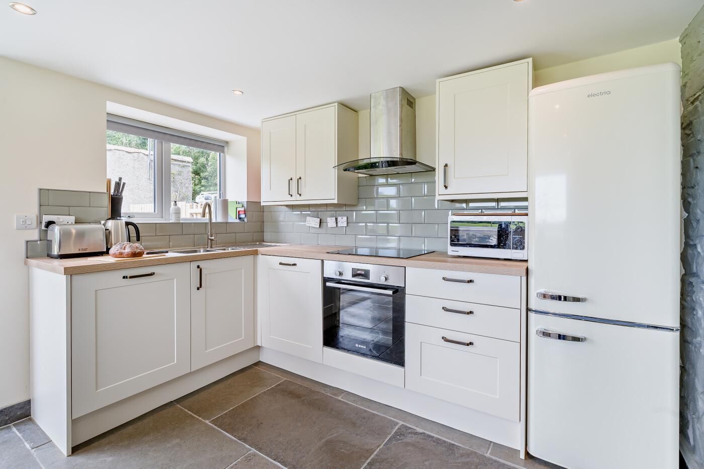 Oven, dishwasher, high chair, cookware/dishes/utensils