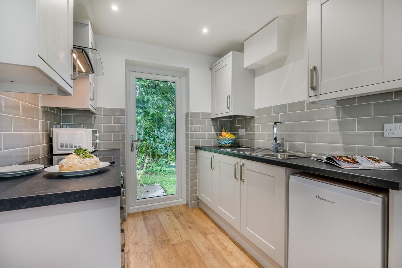 Microwave, oven, highchair, cookware/dishes/utensils