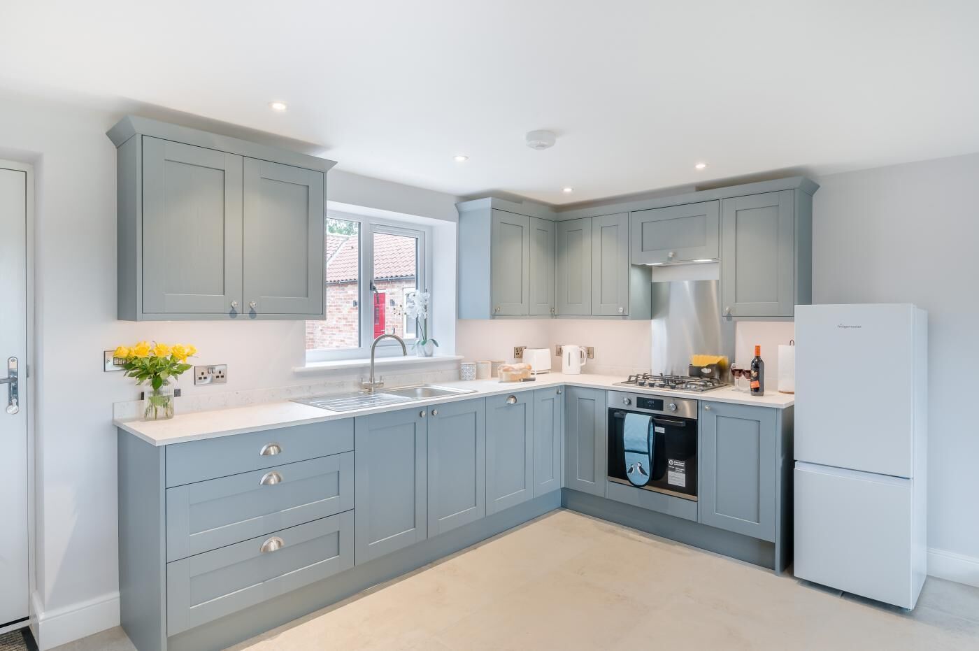 Oven, dishwasher, high chair, cookware/dishes/utensils