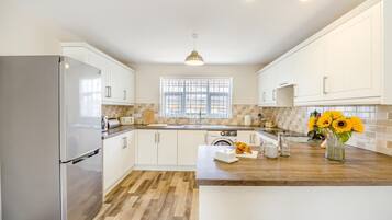 Oven, high chair, cookware/dishes/utensils