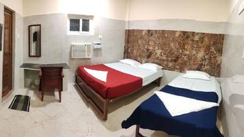 Deluxe Triple Room | Desk, free WiFi