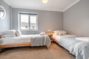 Iron/ironing board, travel crib, free WiFi, bed sheets