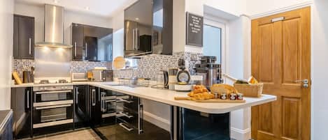 Microwave, oven, high chair, cookware/dishes/utensils